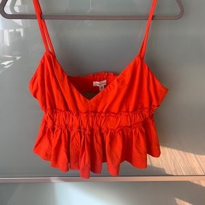 orange peplum top